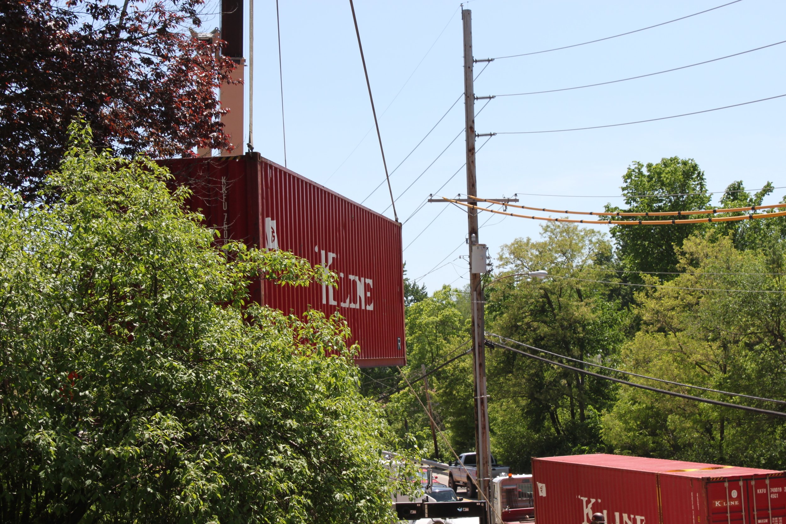 Container moving into place while next one is at the ready