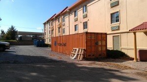 Container-behind-a-hotel-300x169