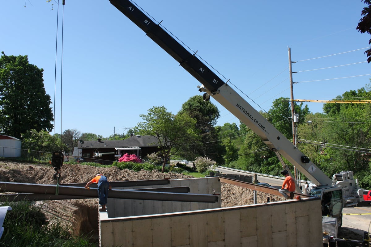 Moving the support steel beams into place